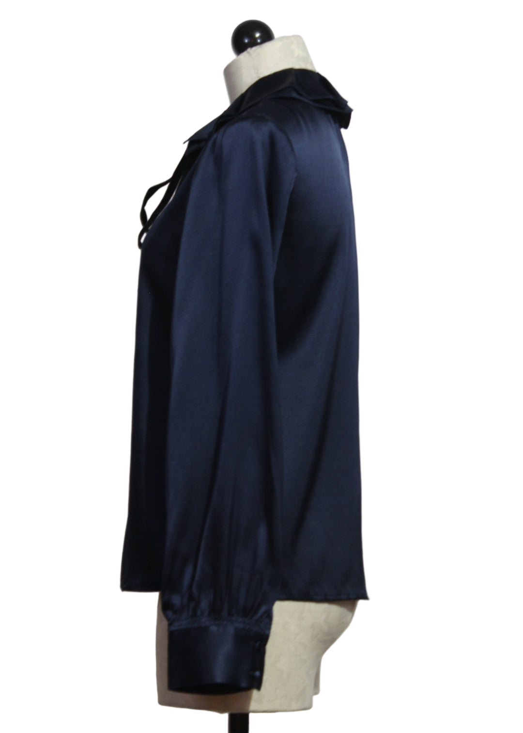 side view of Midnight Blue Emerson Blouse by Cartolina with a Ruffle Collar and a Black Velvet Tie at the neck