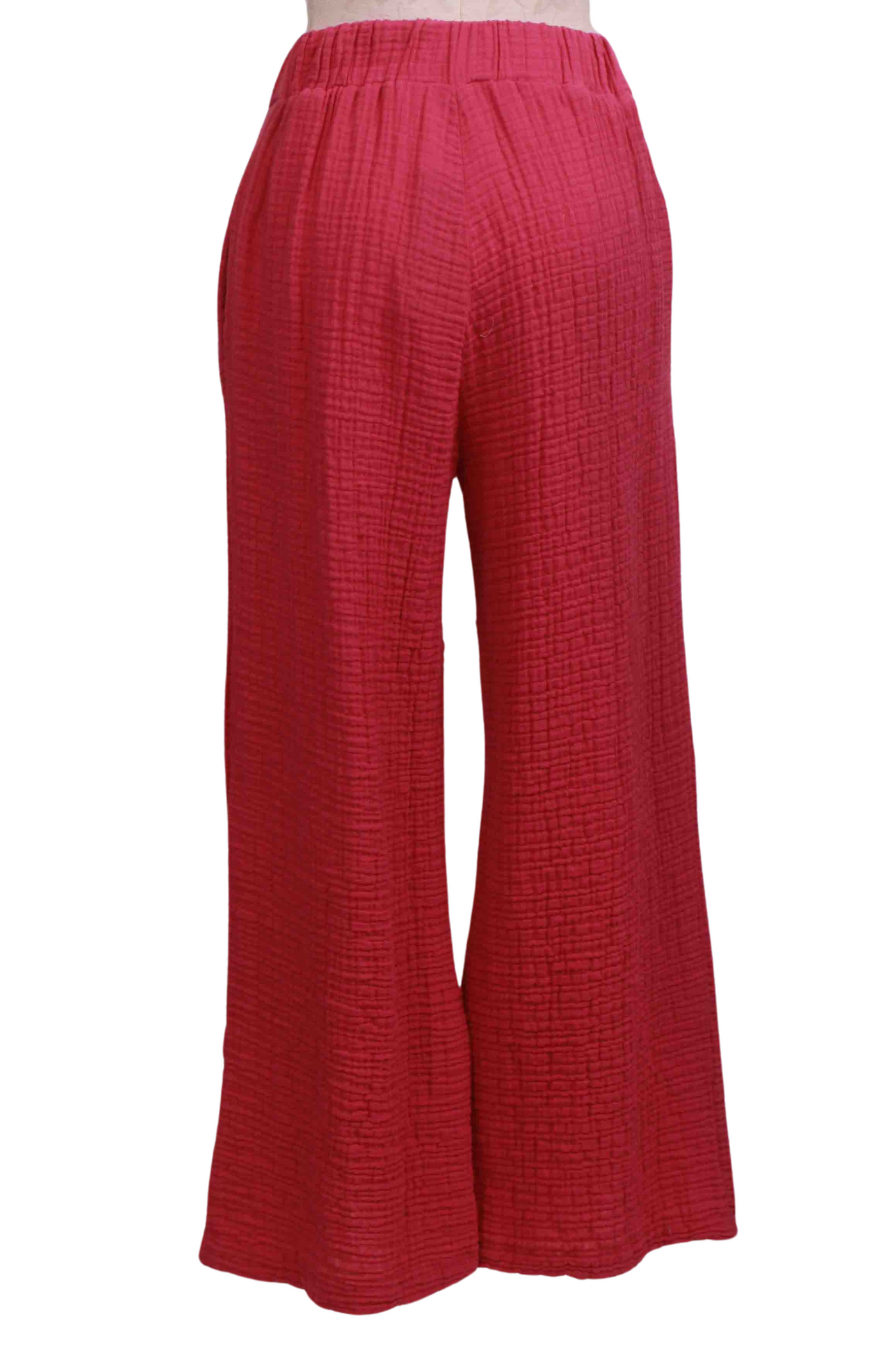 back view of Raspberry Harmony Gauzy Cotton Pant by Kozan with a vent detail at the hemline