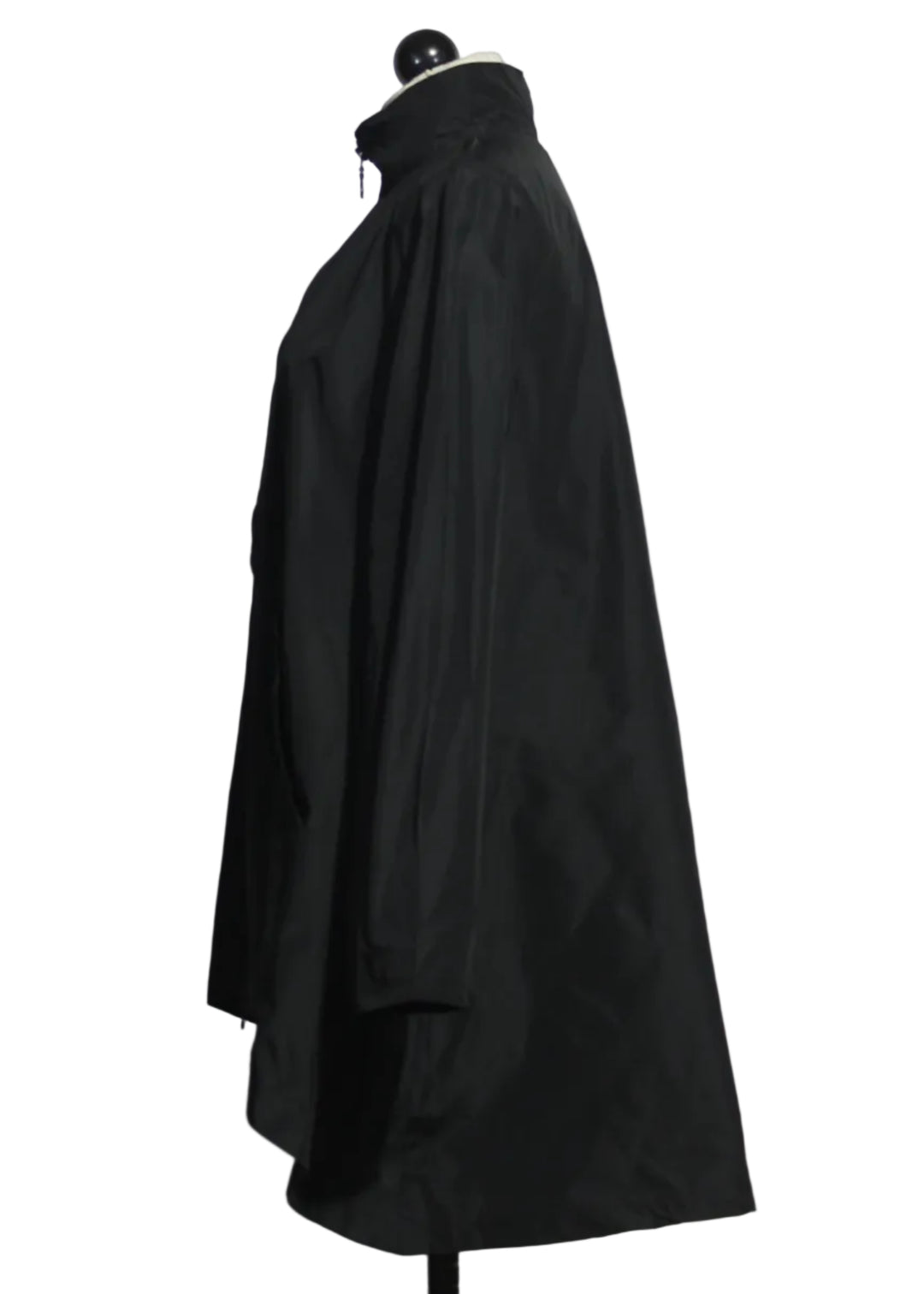 side view of The black Jane Jacket by Kozan in a flared hi-lo body with a two-way zip up front