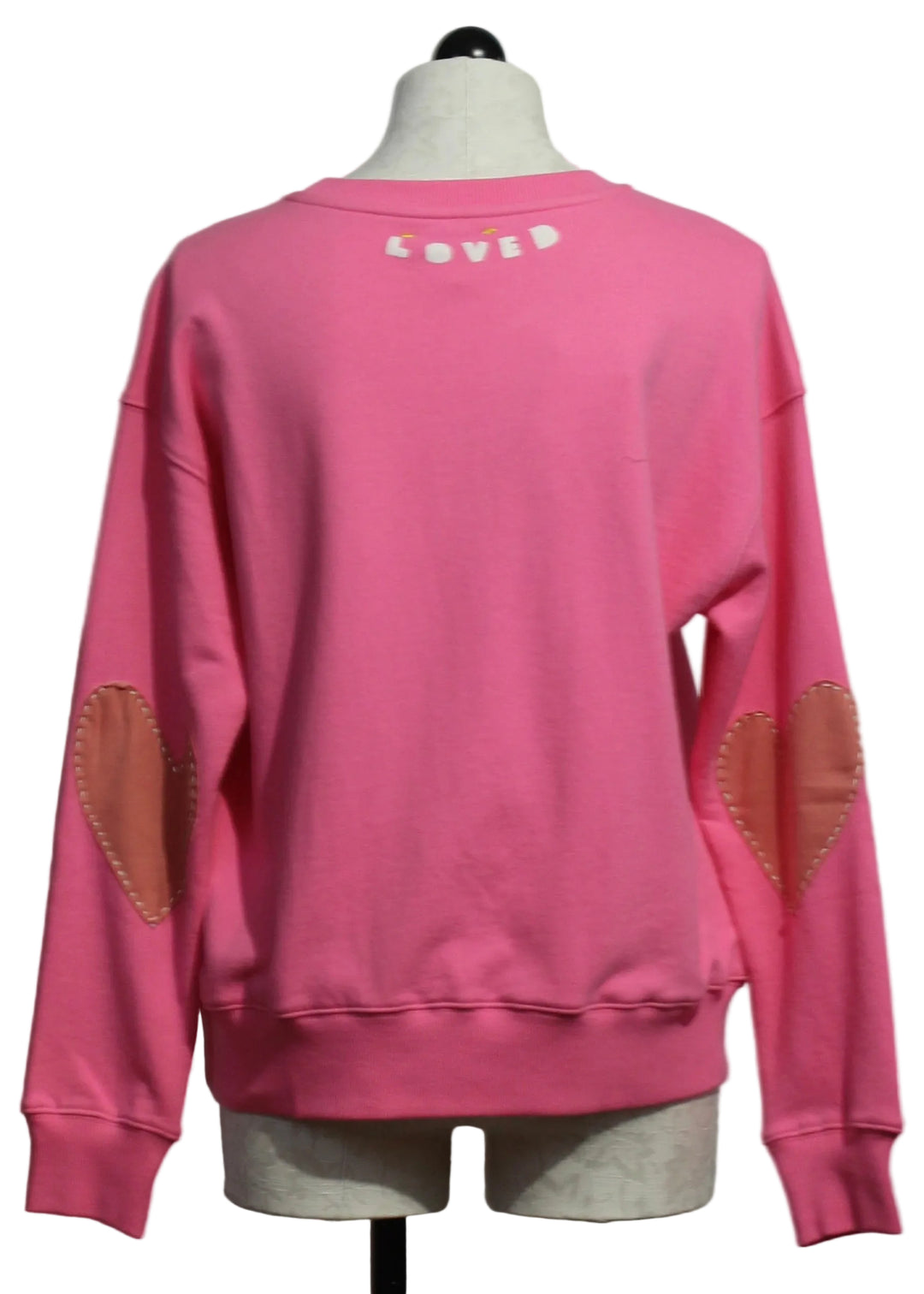 back view of Palm Pink Ex-Boyfriend Patchwork Sweatshirt by Kerri Rosenthal with Orange Imperfect Heart Elbow Patches