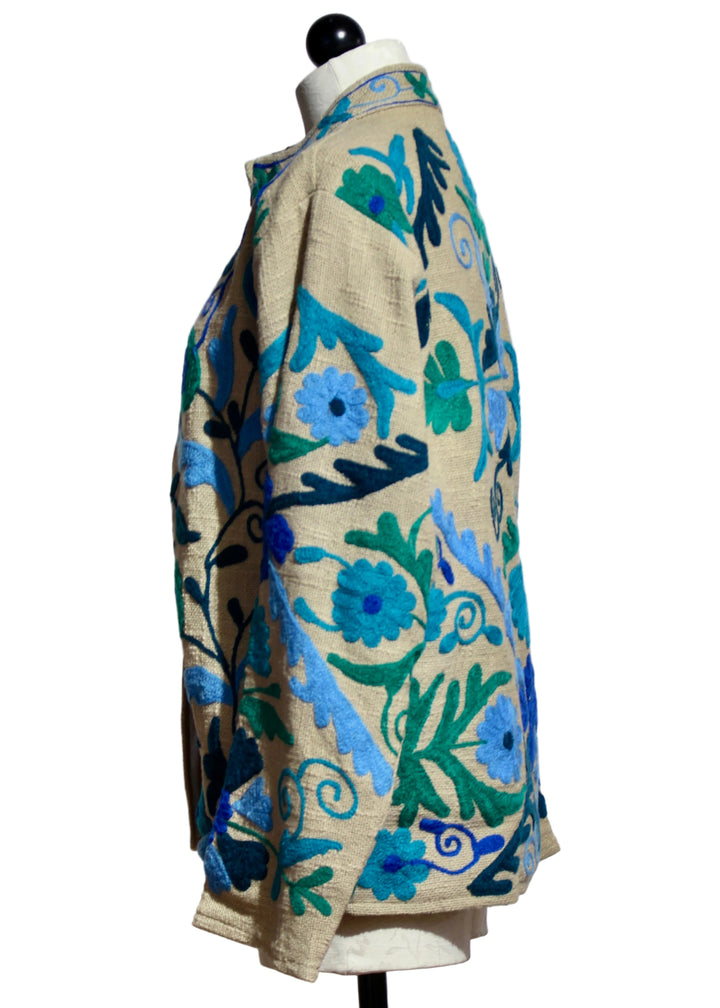 Side view of Natural/Blue Woven Embroidered Floral Jacket by Nikky