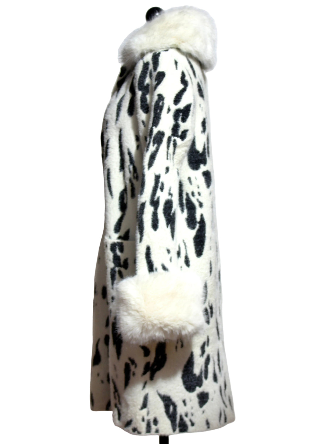 side view of The Black and White Dalmation Print Faux Fur Jacket by Nikky 