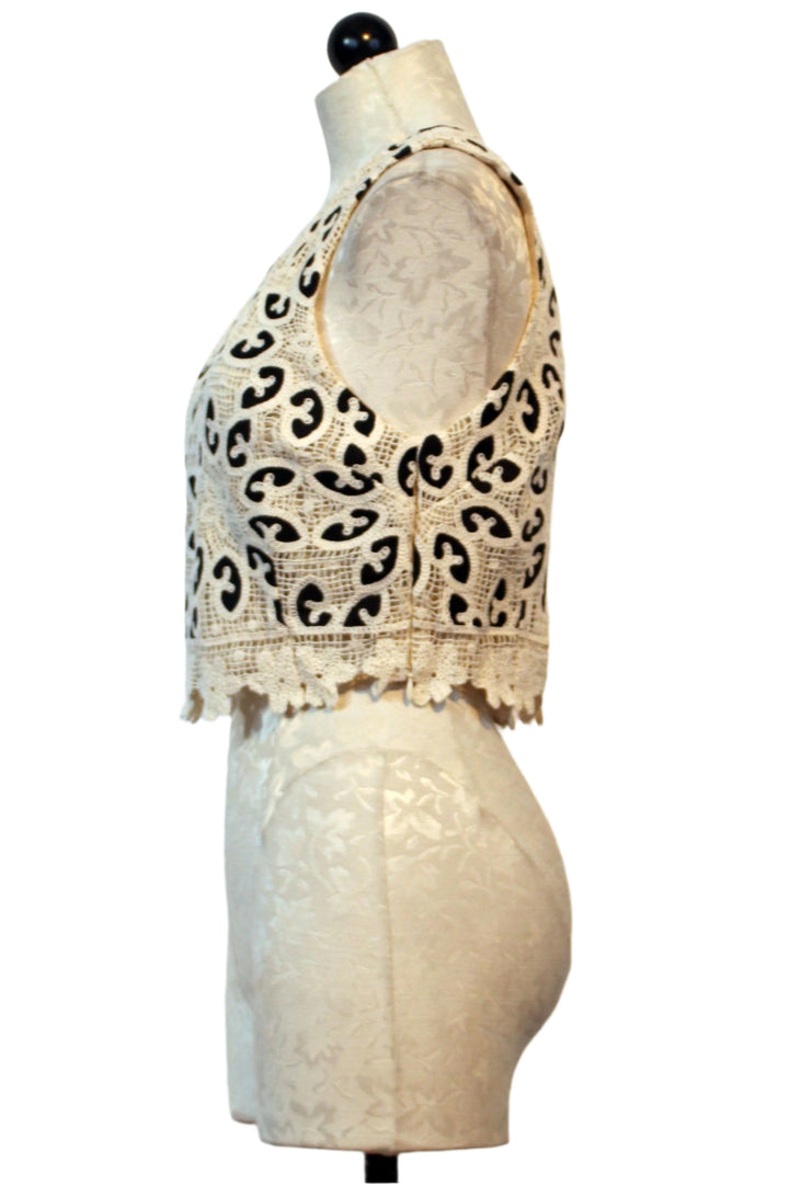 side view of Ivory Lace with Black Cropped Isabelle Top by Caballero