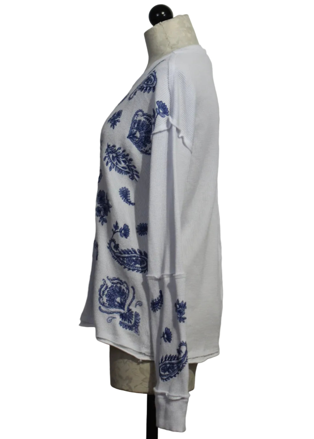 side view of The Patchwork Thermal Top by Johnny Was in White with Blue Floral Embroidery