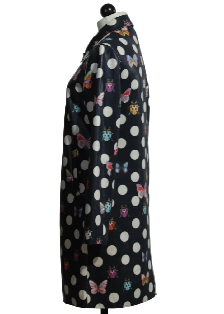 side view of The Polka Dot & Butterfly Print Pleather Jacket by Adore in Black Multi