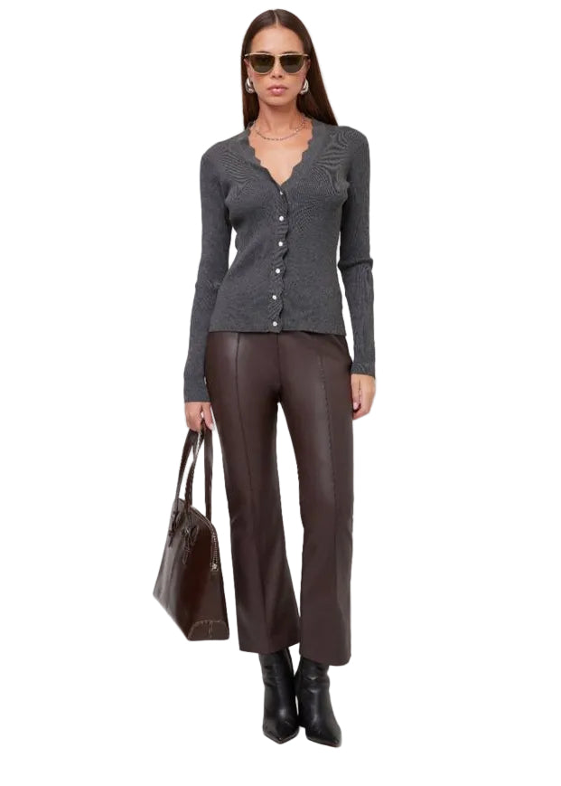 Model wearing The Charcoal Bliss Scallop Edge Cardigan by Fifteen Twenty