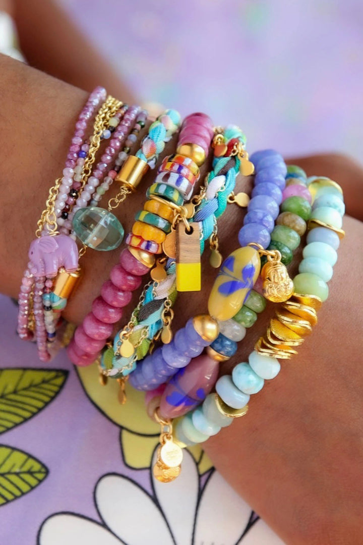 stack of multicolored The Julep Stretch Bracelets by Catherine Page are a stunning mix of bold jade beads and multi-colored African accents creates a cheerful, eye-catching design