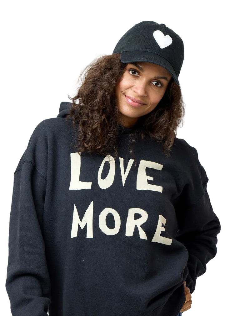 Model wearing the Baseball Hat Heart Patch Black White-Kerri Rosenthal