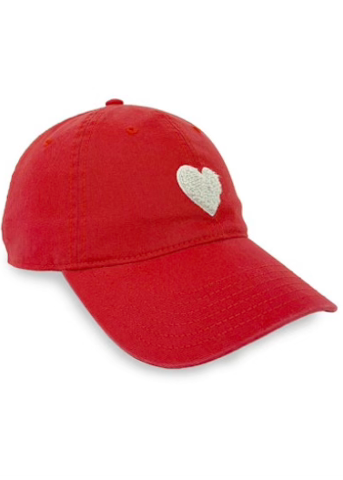 side view of Cherry Red KR Imperfect Hat by Kerri Rosenthal with a White Chenille Heart 