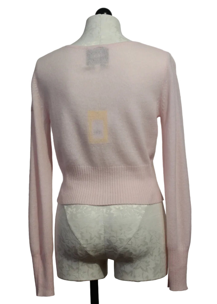 back view of Pink Cropped Charmed Cardigan by Kerri Rosenthal 