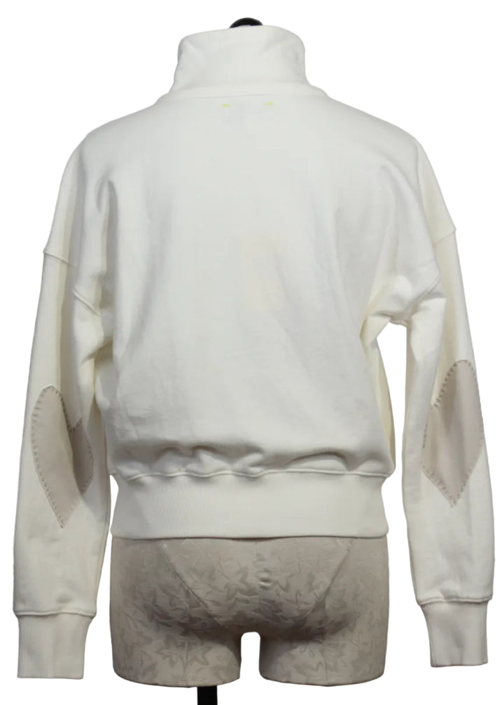 back view of Cream Colored Zip Up Mock Neck Sweatshirt by Kerri Rosenthal with taupe-colored heart patches on the sleeves