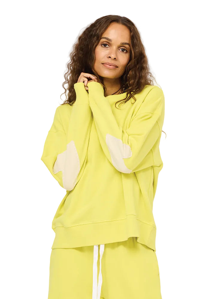 model wearing the Cactus colored Ex-Boyfriend Patchwork Sweatshirt by Kerri Rosenthal 