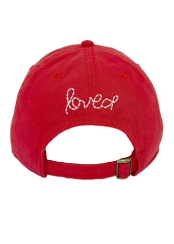 back view of Cherry Red KR Imperfect Hat by Kerri Rosenthal with a White Chenille Heart 