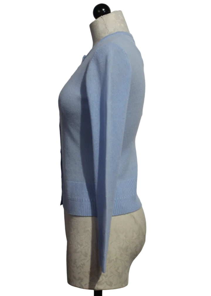 side view of Blue Aura Kinsley Classic Cardigan by Alashan Cashmere