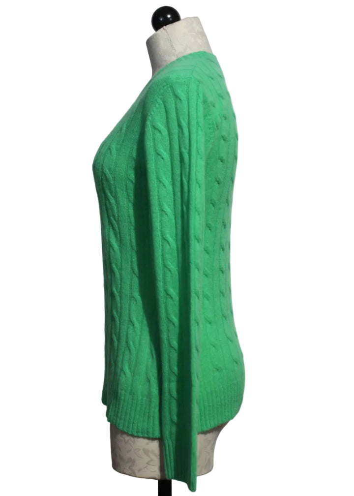 side view of Kelly colored Breezy Cable Pullover by Alashan Cashmere