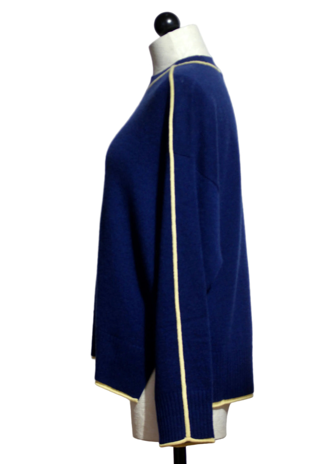 Side view of the Midnight and Butter colored Cashmere Eliana Crew Sweater with Tipping by Alashan Cashmere