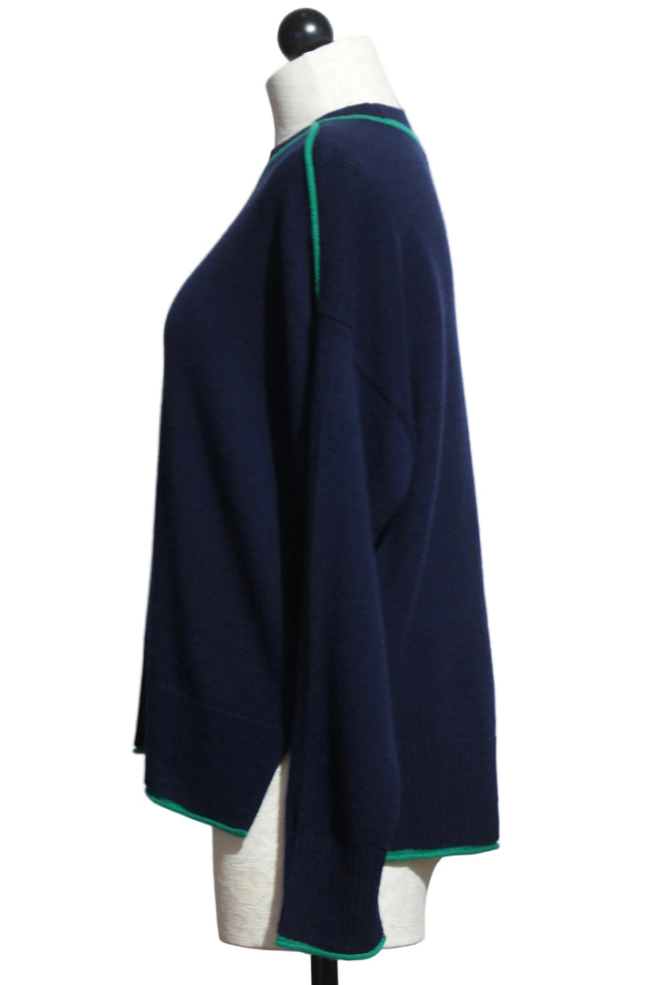 Side view of the Indigo and Flora colored Cashmere Eliana Crew Sweater with Tipping by Alashan Cashmere