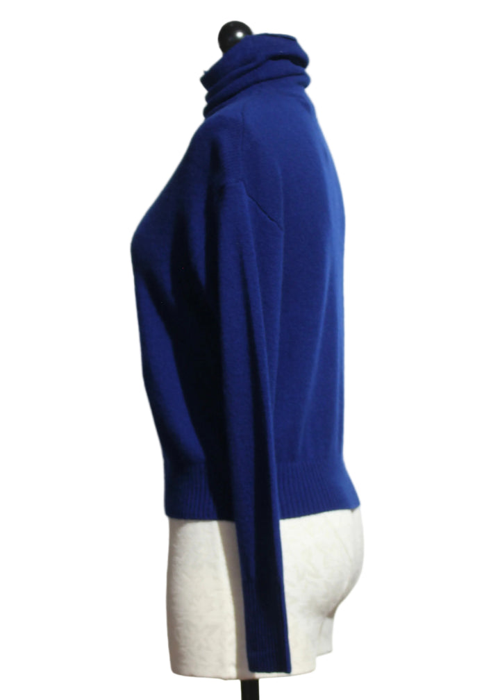 side view of Gala colored Cashmere Rosa Drop Shoulder Turtleneck by Alashan Cashmere 