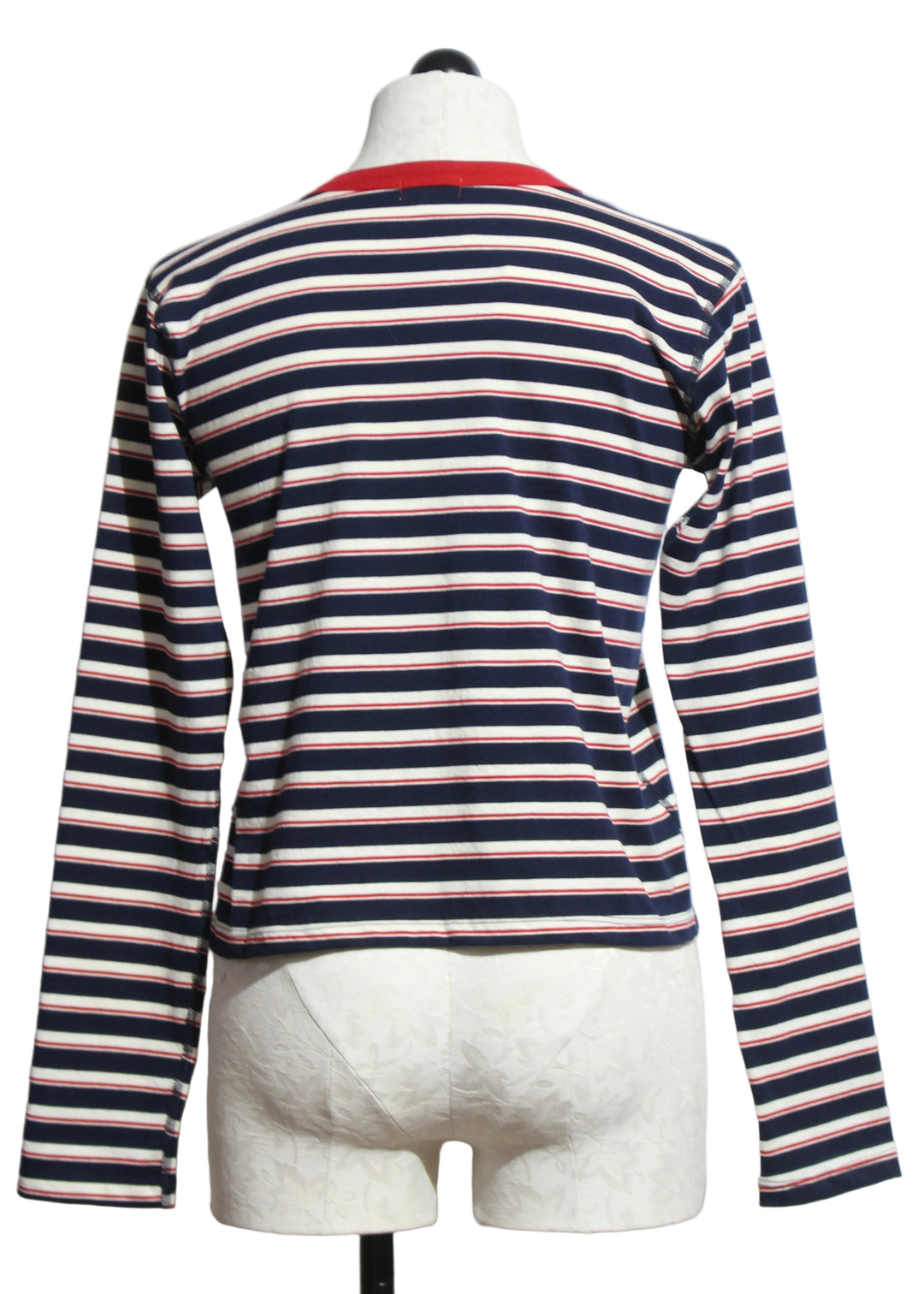 Back view of the Navy and Natural Lucy Long Sleeve Stripe Tee by Asher with a red trim Crew neckline