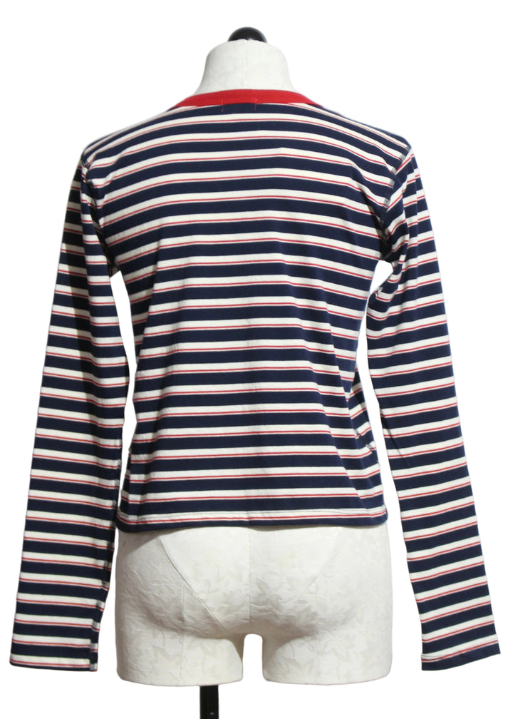 Back view of the Navy and Natural Lucy Long Sleeve Stripe Tee by Asher with a red trim Crew neckline