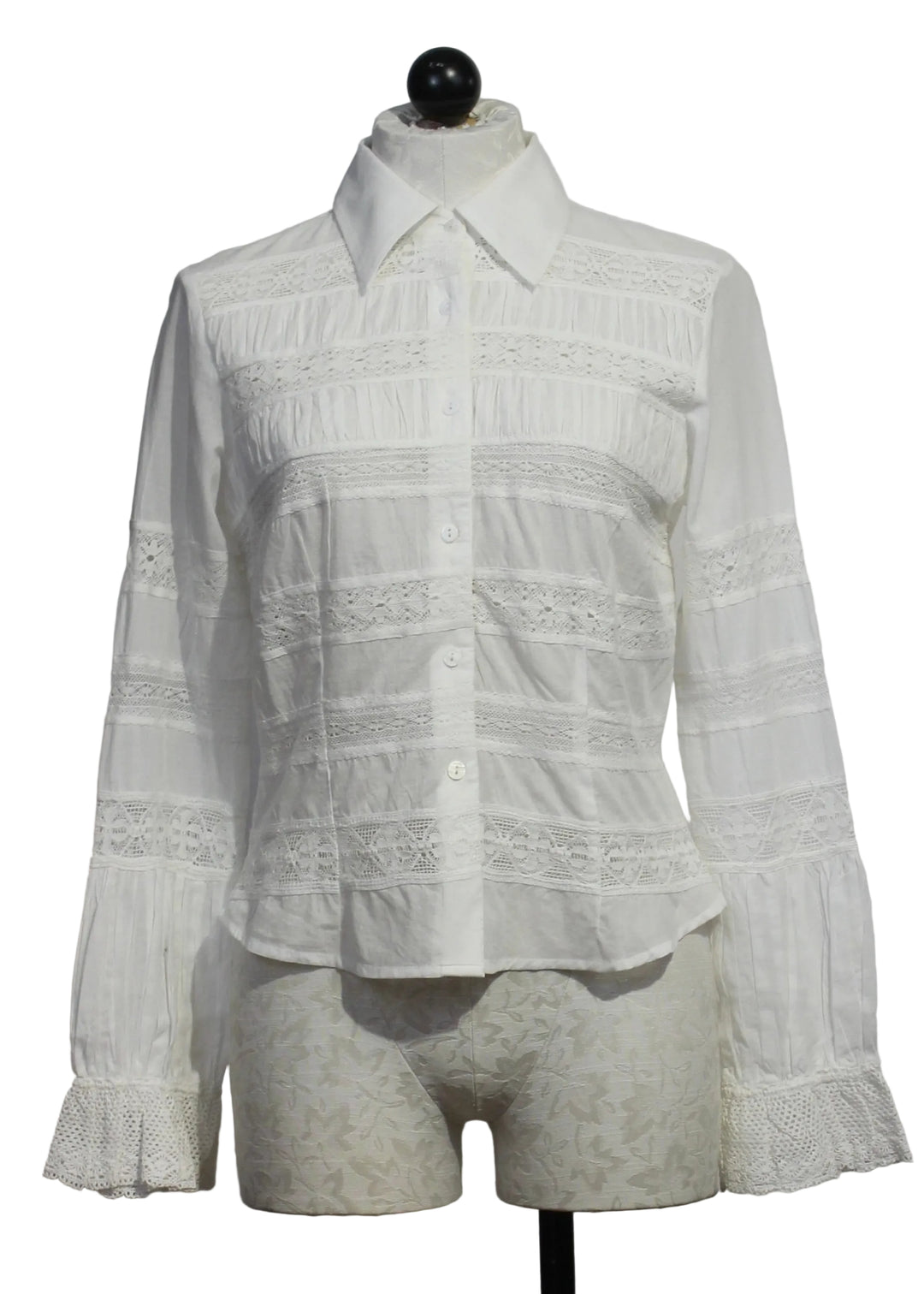 The Lacey Top by Love the Label is a white long-sleeve top