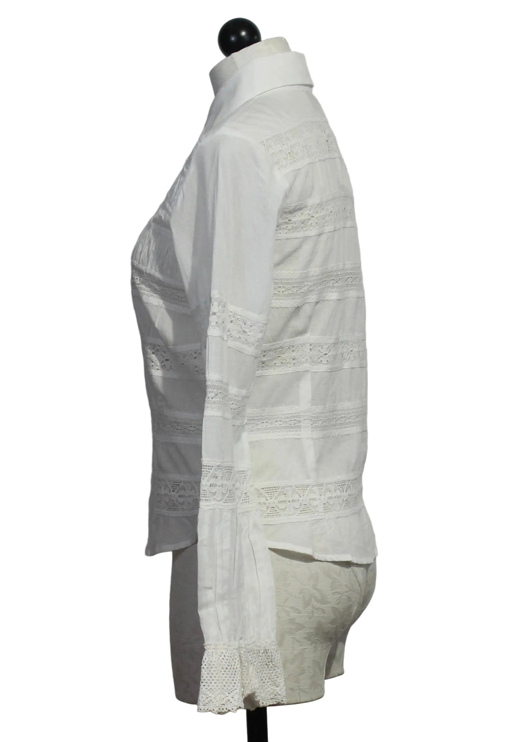 side view of The Lacey Top by Love the Label is a white long-sleeve top