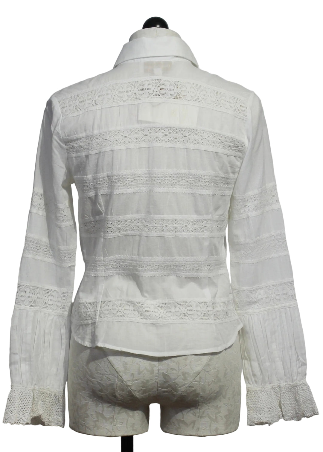 back view of The Lacey Top by Love the Label is a white long-sleeve top