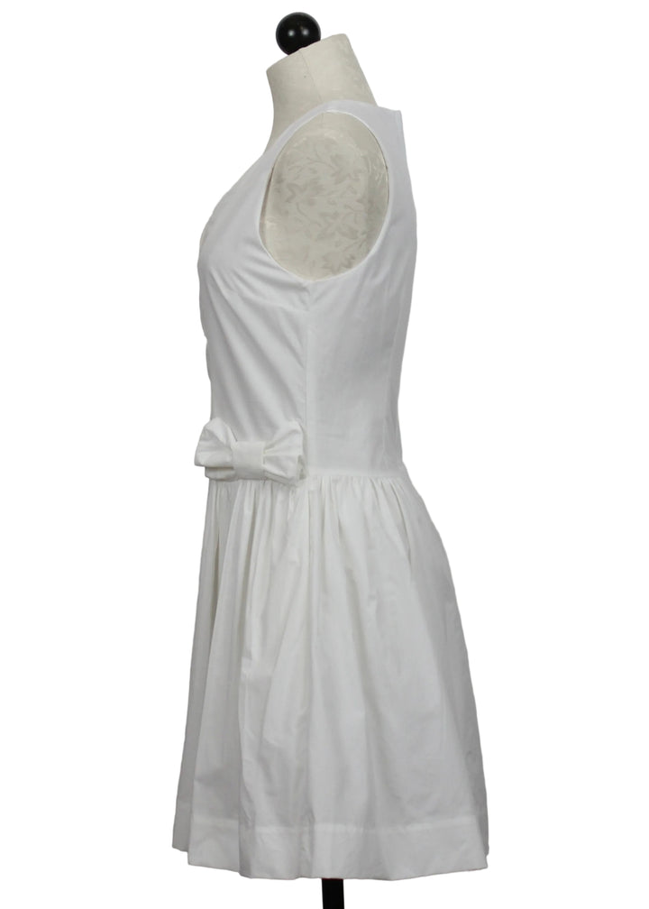 Side view of The Bright White Prim Mini Dress by Love The Label 
