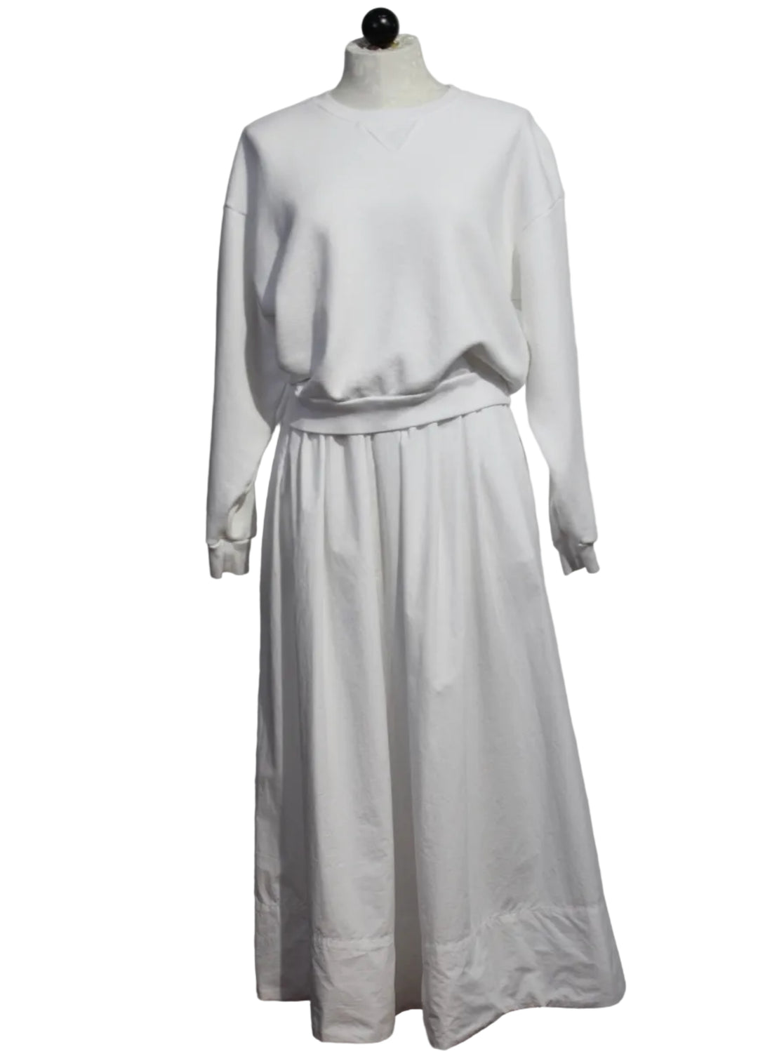 The White Kate Poplin Skirt by Asher paired with the White Cameron Long Sleeve Pullover by Asher