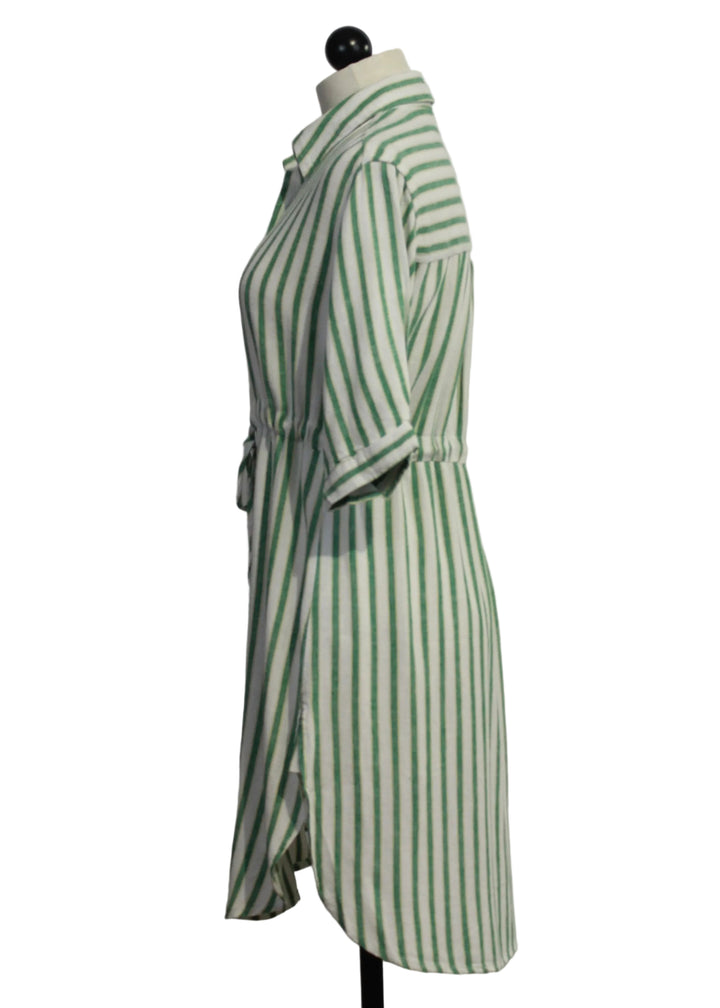 side view of The Jenneva Dress by Velvet Heart in a Green Foliage color 