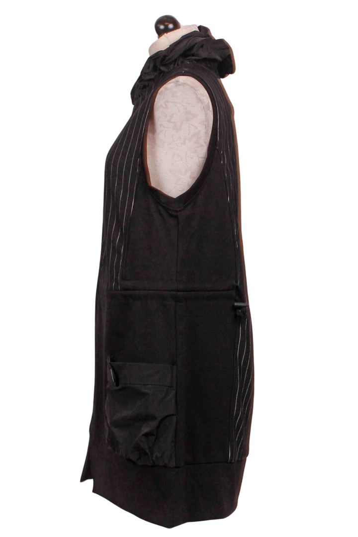 side view of Black Pinstriped Sleeveless Zip Front Tunic by Reina Lee