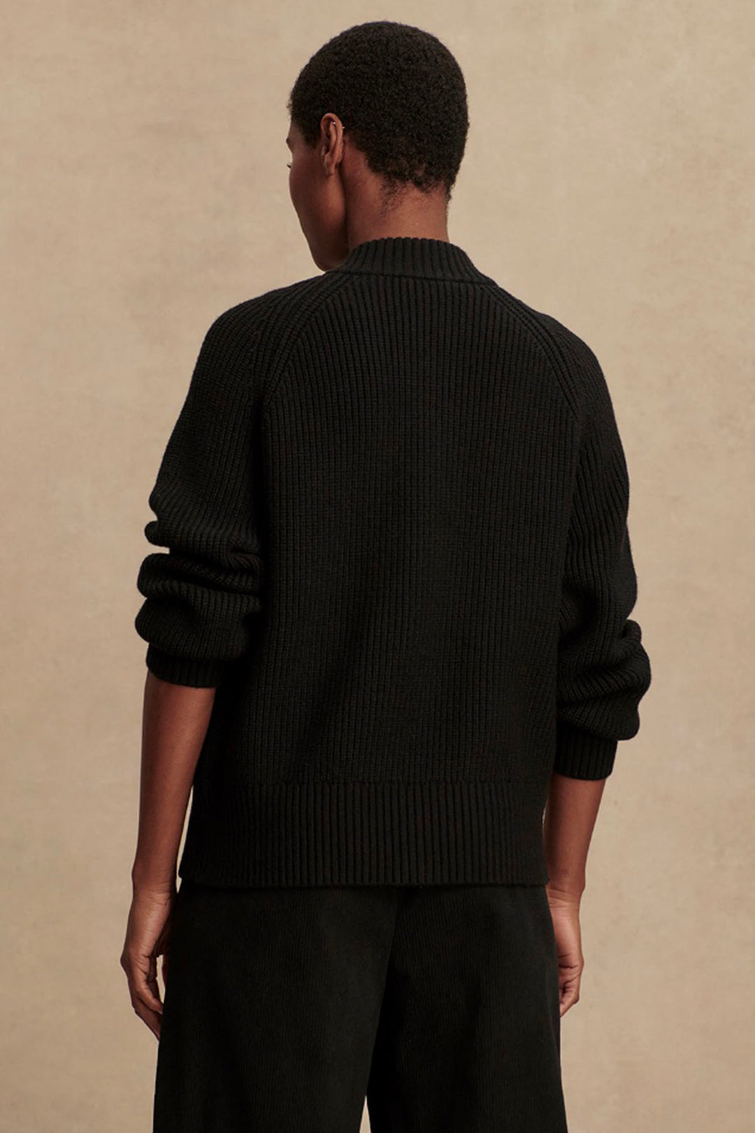 back view of The Black Milo Zip Through Knit Jacket by Varley
