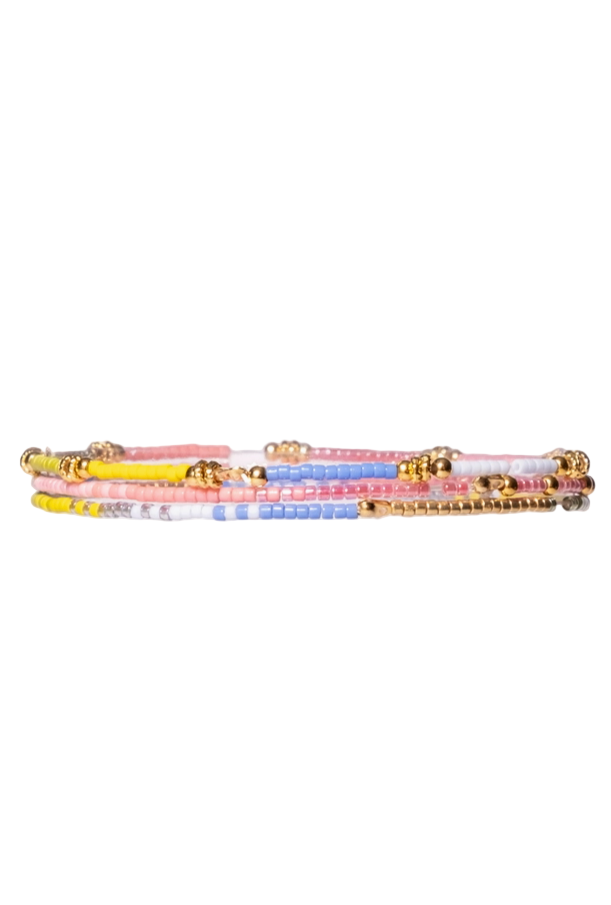 side view of Set of 3 Miyuki Beaded Stretch Bracelets by Mayana Designs Co in Pink/Citron/Blue