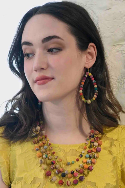 model wearing the Multi colored Kantha Karita Necklace by Worlds Finds with matching earrings