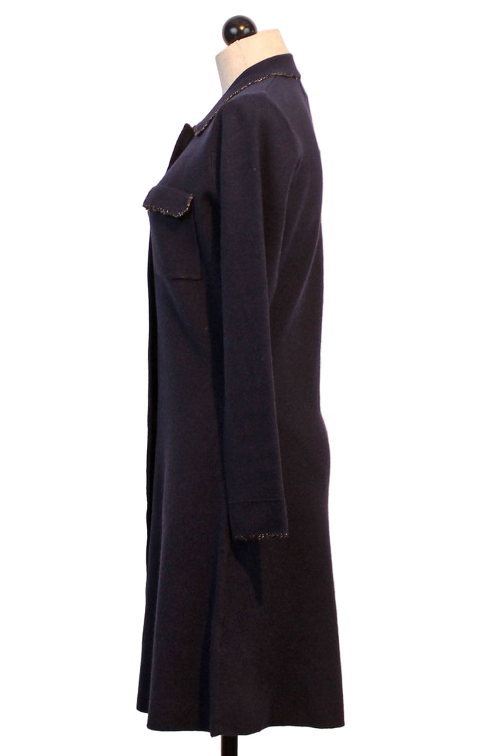 side view of Navy Flared Button Front Knit Dress by Leo & Ugo