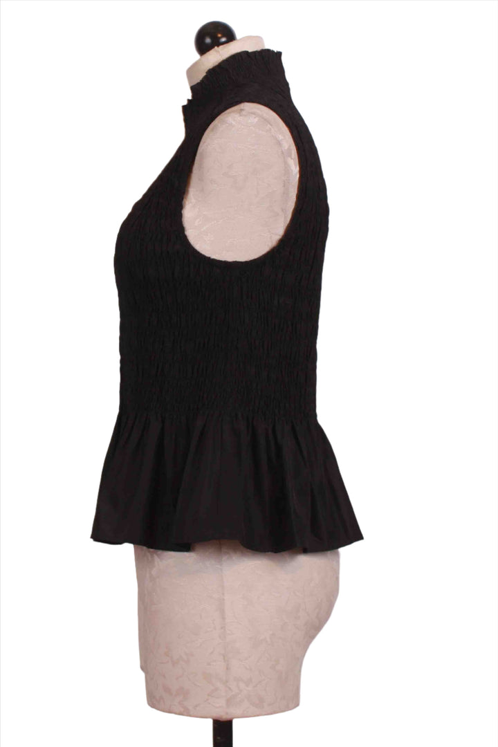 side view of Black Sleeveless Smocked Odie Top by Marie Oliver