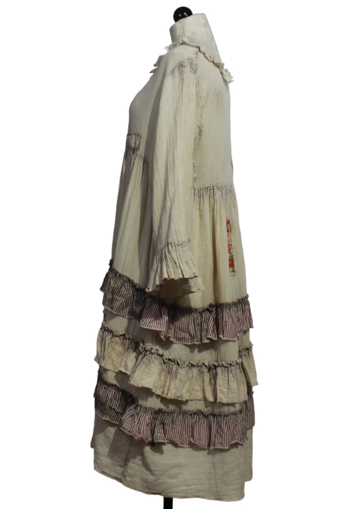 Side View of Cream and Natural Long Sleeve Layered Ruffle Skirt Dress by Paper Lace