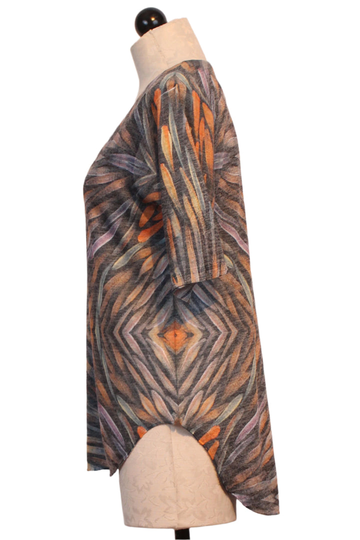 side view of Printed Arrow V Neck Top by Nally and Millie