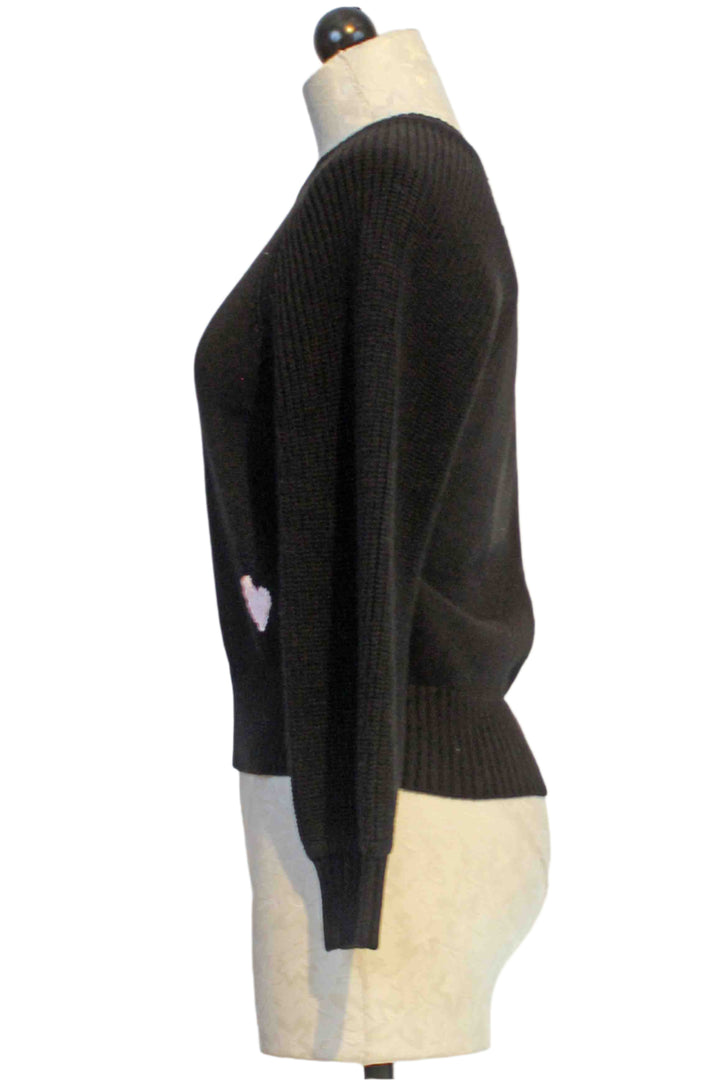 side view of black Puff Sleeve Pullover Sweater by Kerri Rosenthal