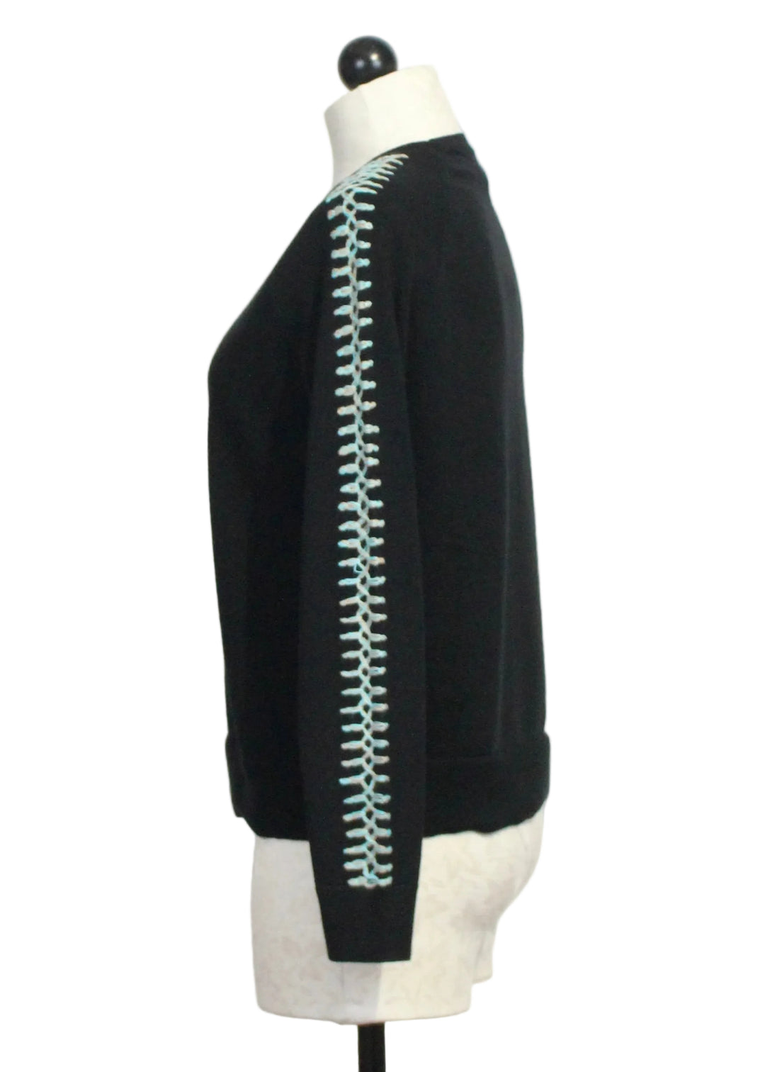 Side view of The Black Stitchy Mix Sweater by Lisa Todd