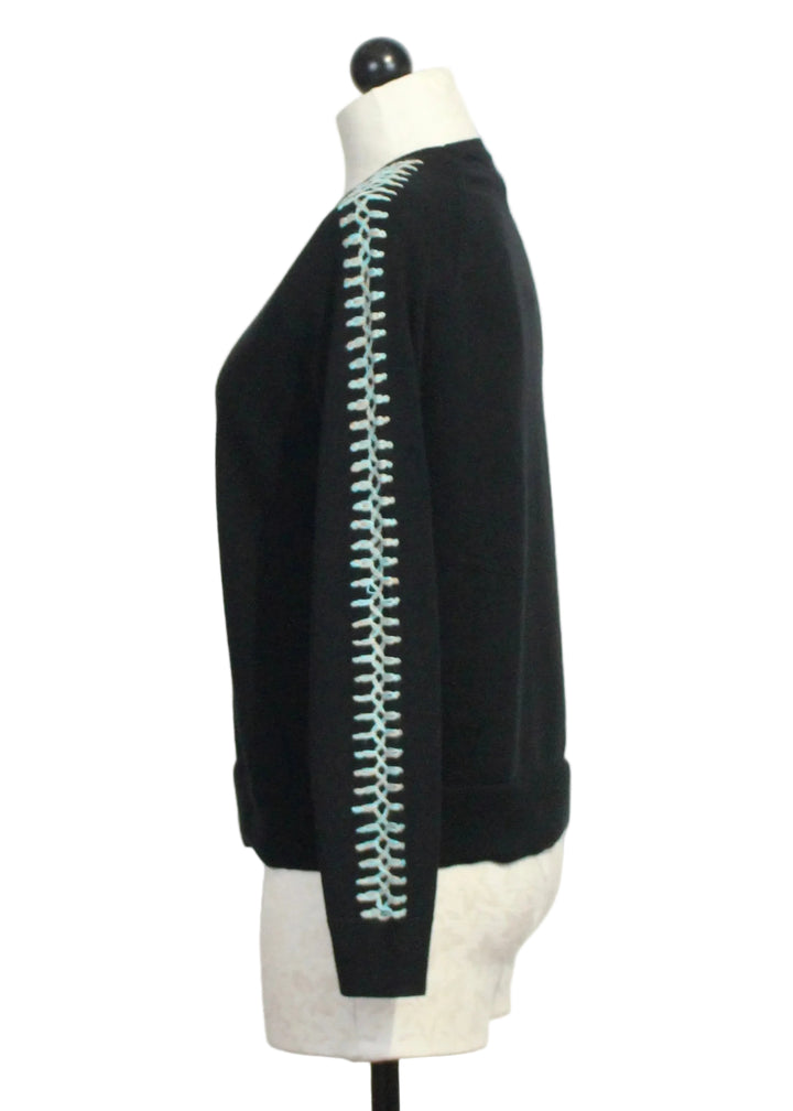 Side view of The Black Stitchy Mix Sweater by Lisa Todd