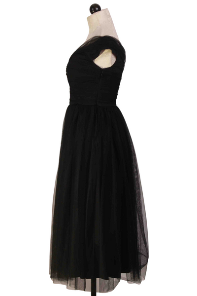 side view of black Off-the-Shoulder Tulle Renai Dress by Trina Turk