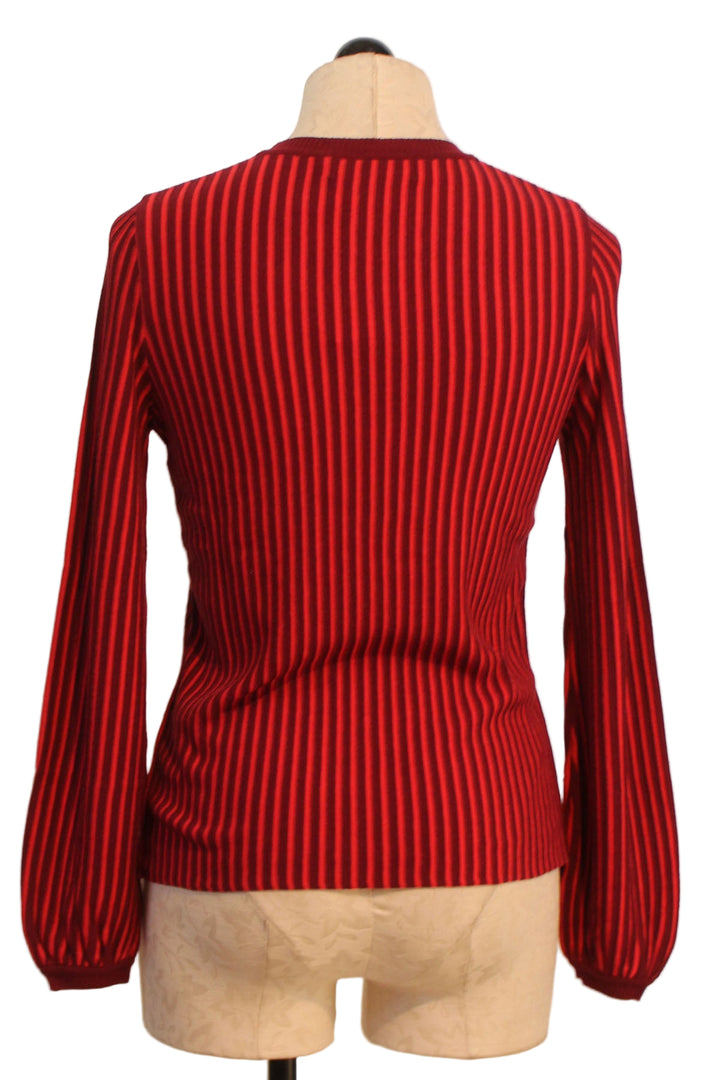 back view of Rojo Striped Logan Sweater Top with slightly puffed sleeves by Aldo Martins