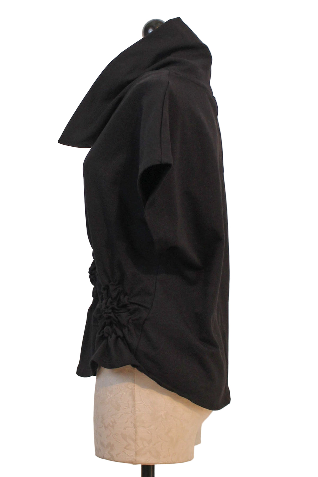 side view of Roygen Top by Kozan with ruched rosette-like detail along the bottom