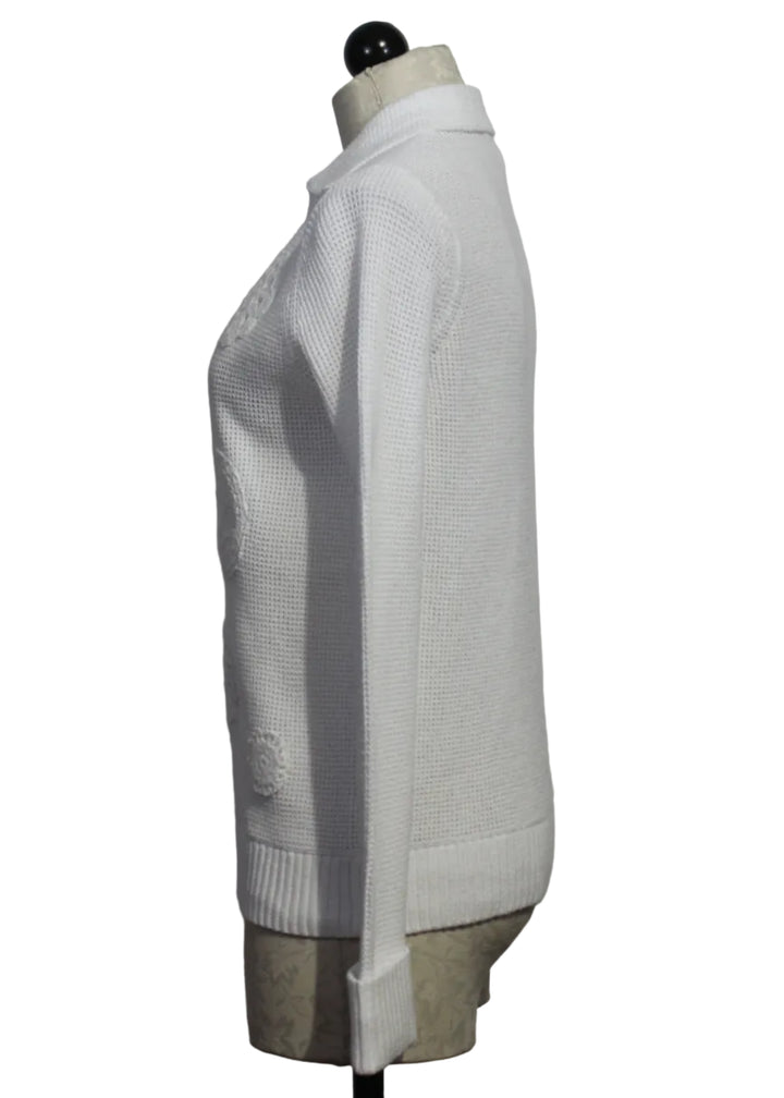 side view of White Knit Bliss Collared V Neck Sweater by Lisa Todd 
