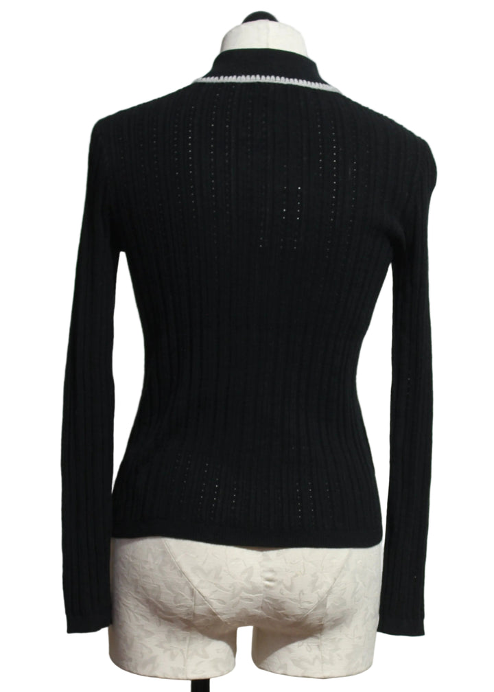 back view of Black Stitch Please Cardigan by Lisa Todd