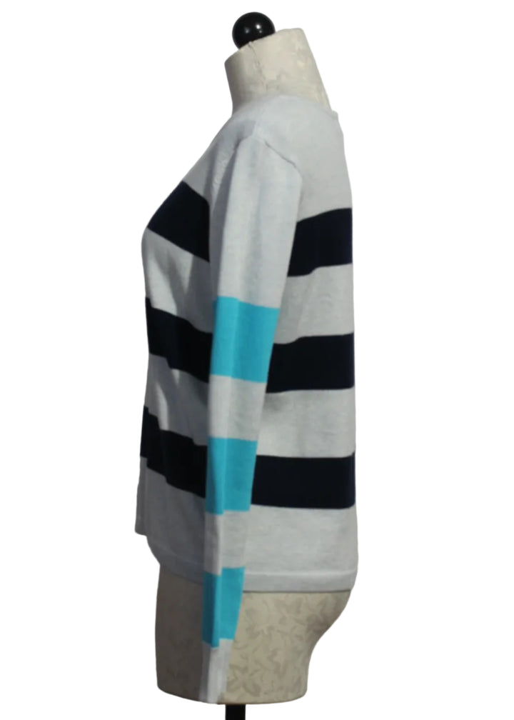 side view of Blue Ice and Navy Cult Classic Striped Sweater by Lisa Todd