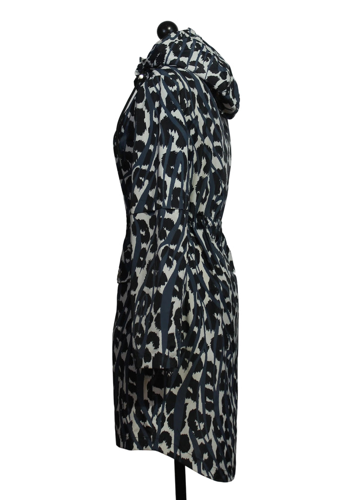 side view of The Ocean Print Hooded Rainjacket by Nikki Jones 