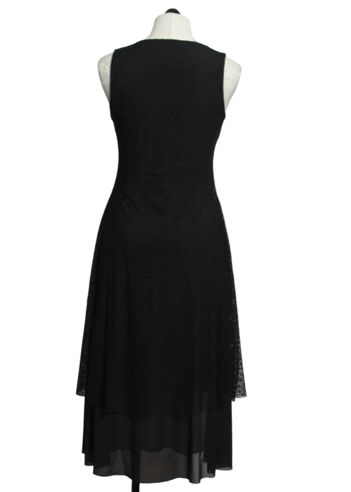 back view of The black sheer polka dot mesh overlay Moana Dress by Kozan 