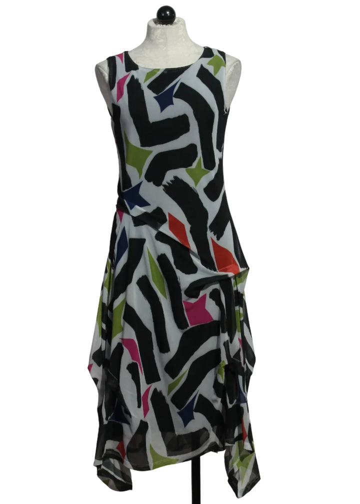The sleeveless Colony Dress by Kozan in a beautiful colorful GEO print